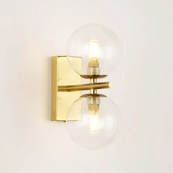 Applique moderna in oro/ottone con due sfere in vetro trasparente per corridoio o camera da letto, compatibile con 2 lampadine G9 "PRAGUE"